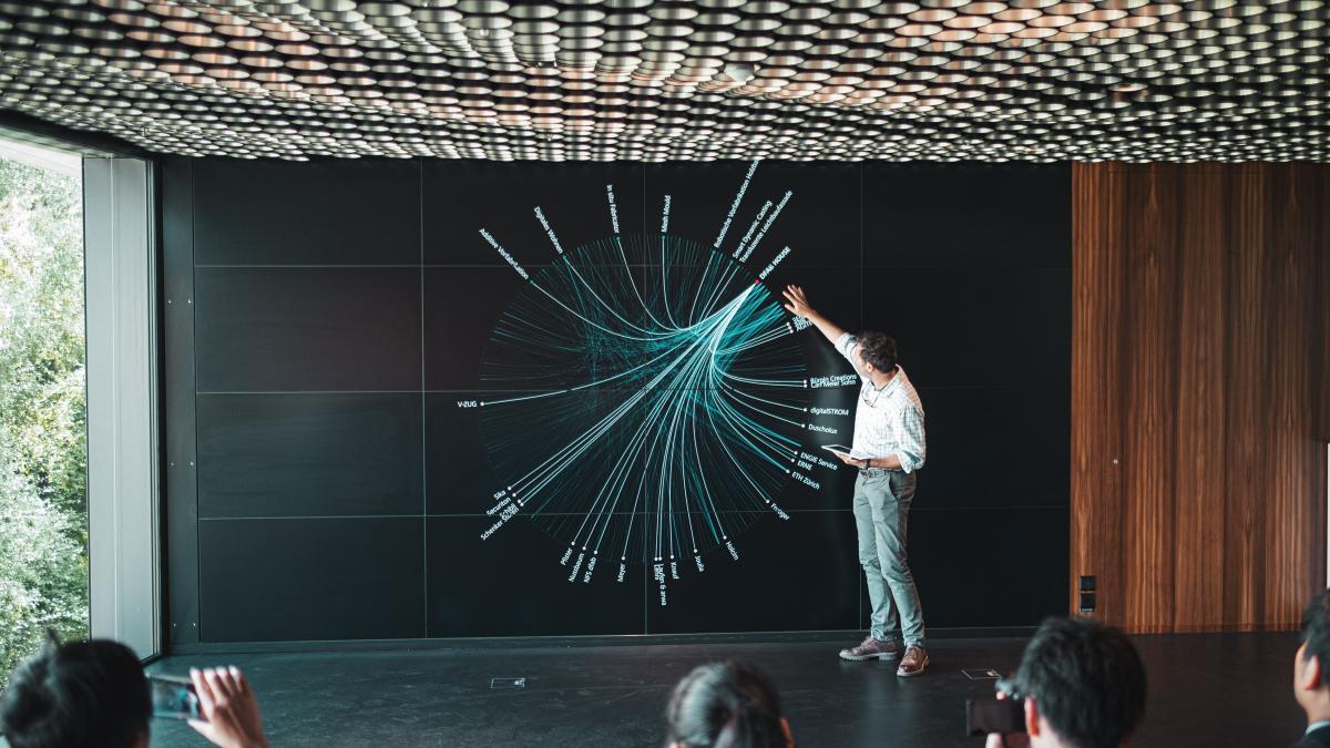  Man presenting data at a conference
