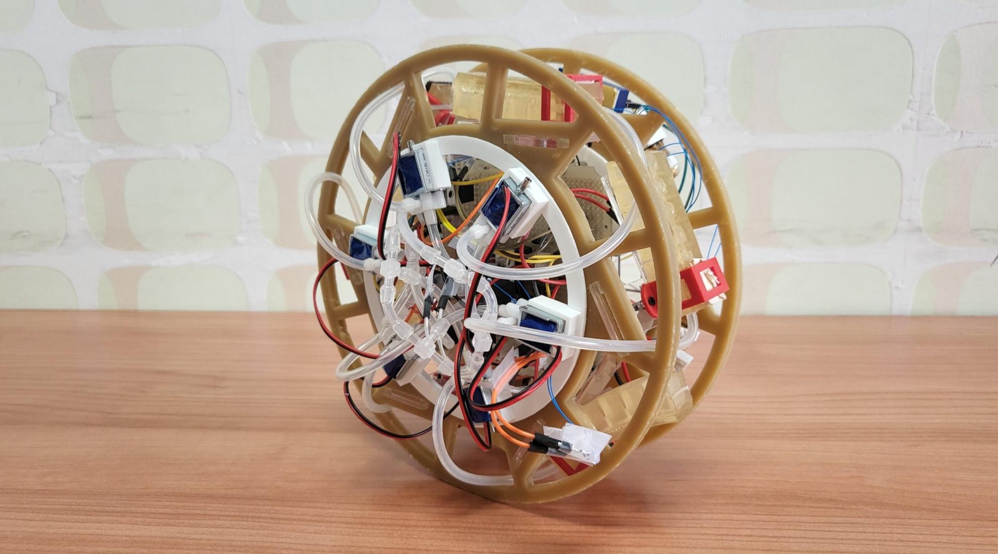 A partially edible rolling robot that uses pneumatic gelatine legs and an edible tilt sensor. 