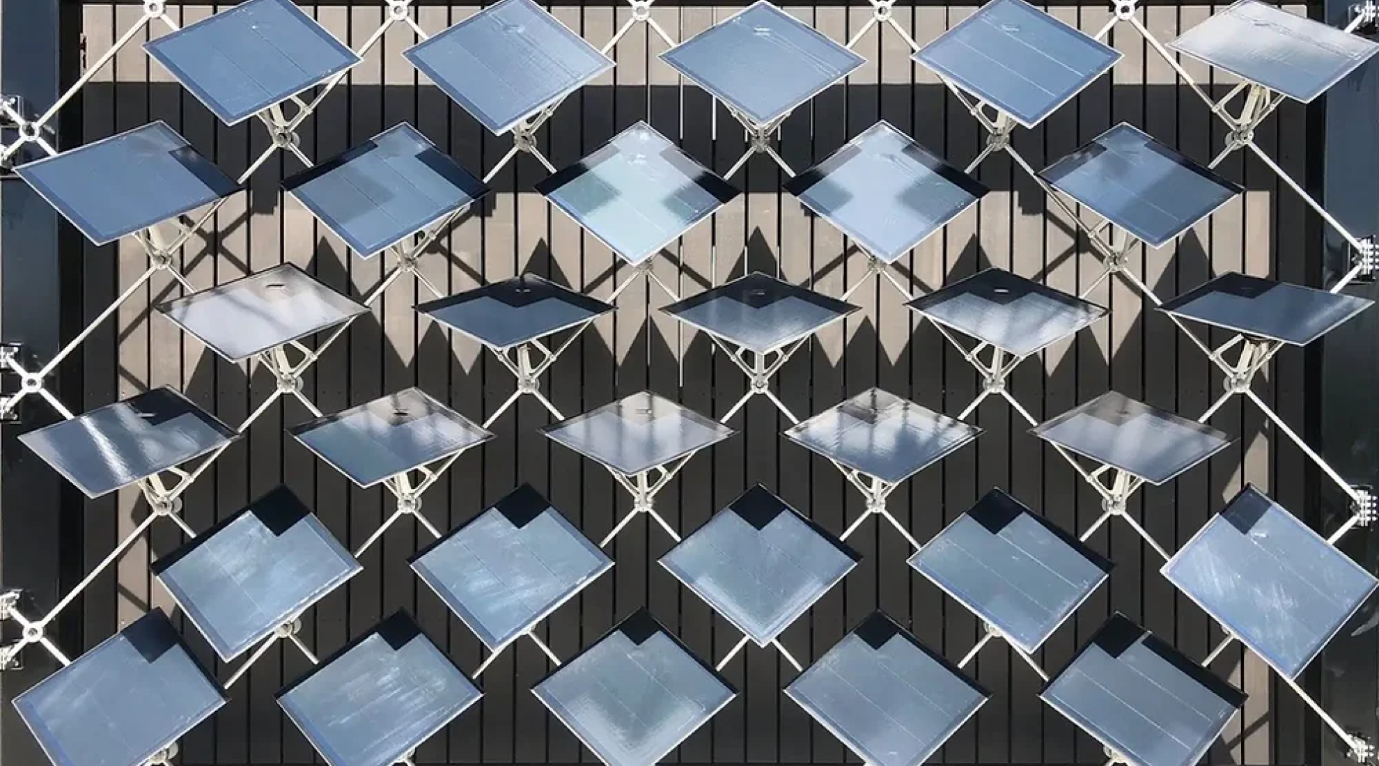 Movable solar panels on facade