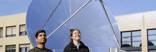 SOHHYtec co-founders in front of the prototype on EPFL campus